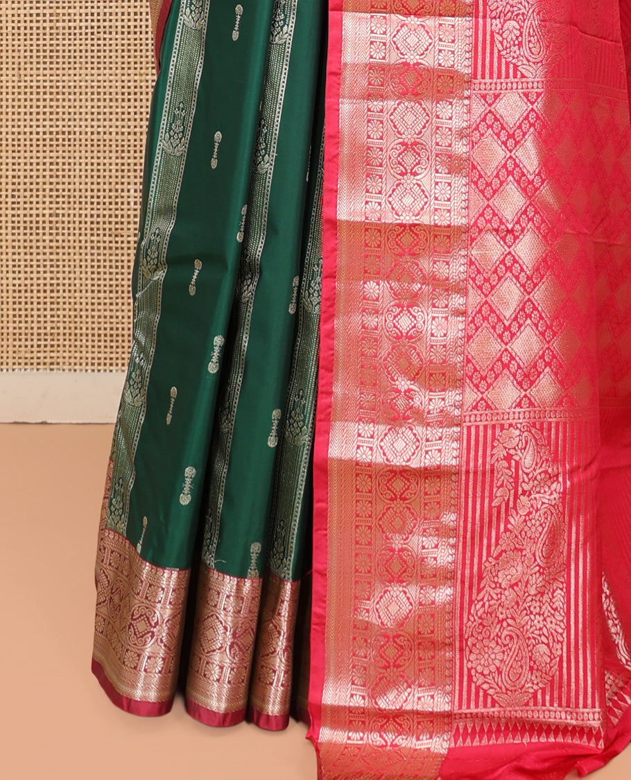 Dark Green Budget Silk Saree, Ornamented with Zari Buttas, Complemented by a Contrast Traditional Zari Border, Pallu of Jaal and Paisleys, and Contrast Blouse