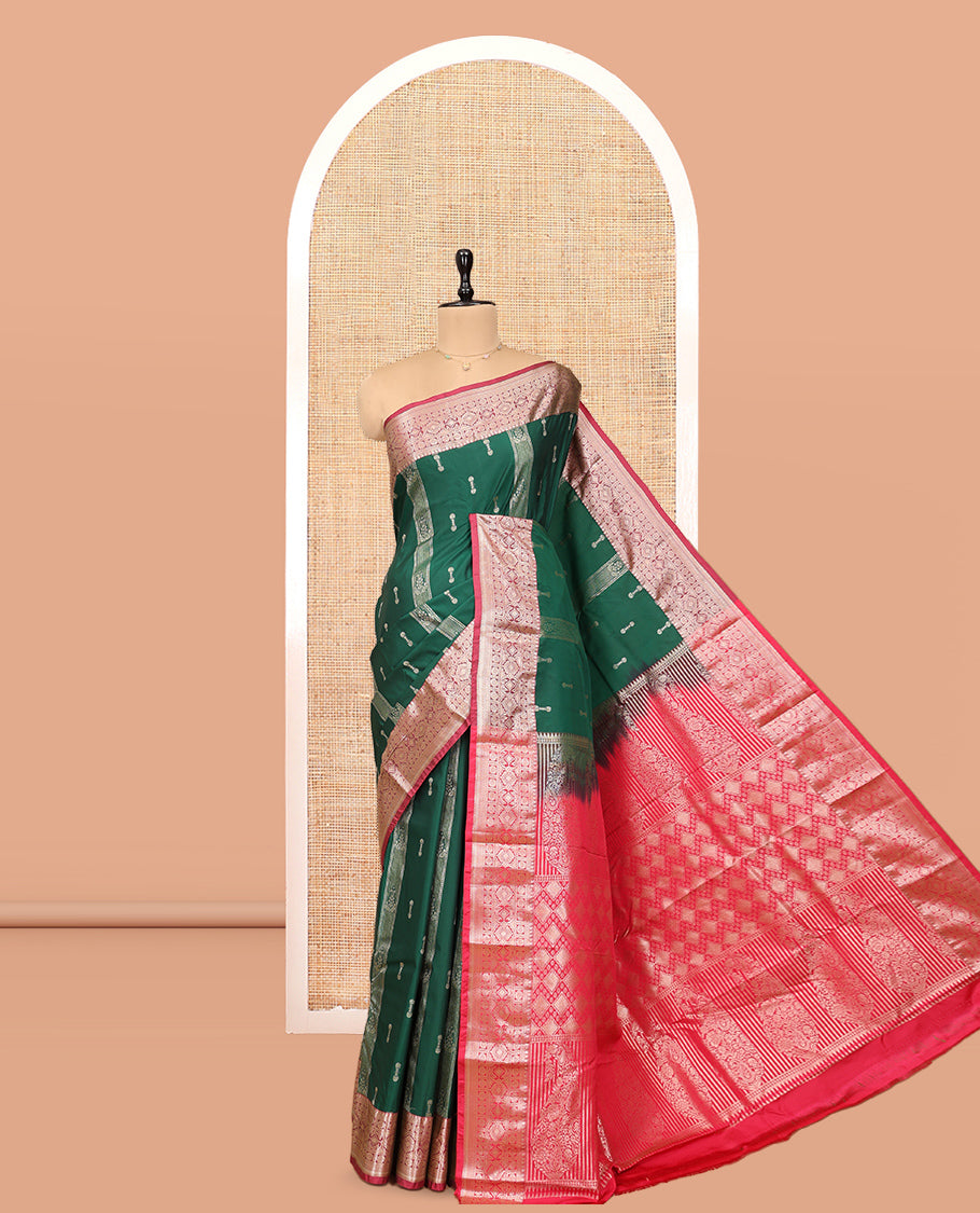 Dark Green Budget Silk Saree, Ornamented with Zari Buttas, Complemented by a Contrast Traditional Zari Border, Pallu of Jaal and Paisleys, and Contrast Blouse