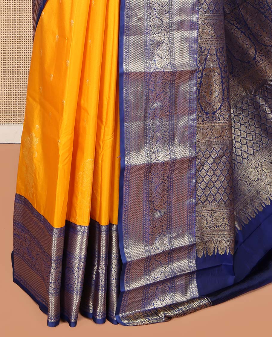 Orange Budget Silk Saree, Delicately Woven with Floral Zari Buttas All Over Its Body, Complemented by a Contrast Traditional Zari Border of Floral Creeper Designs, Grand Pallu of Jaal and Thilakam Designs, and Paired with a Contrast Blouse