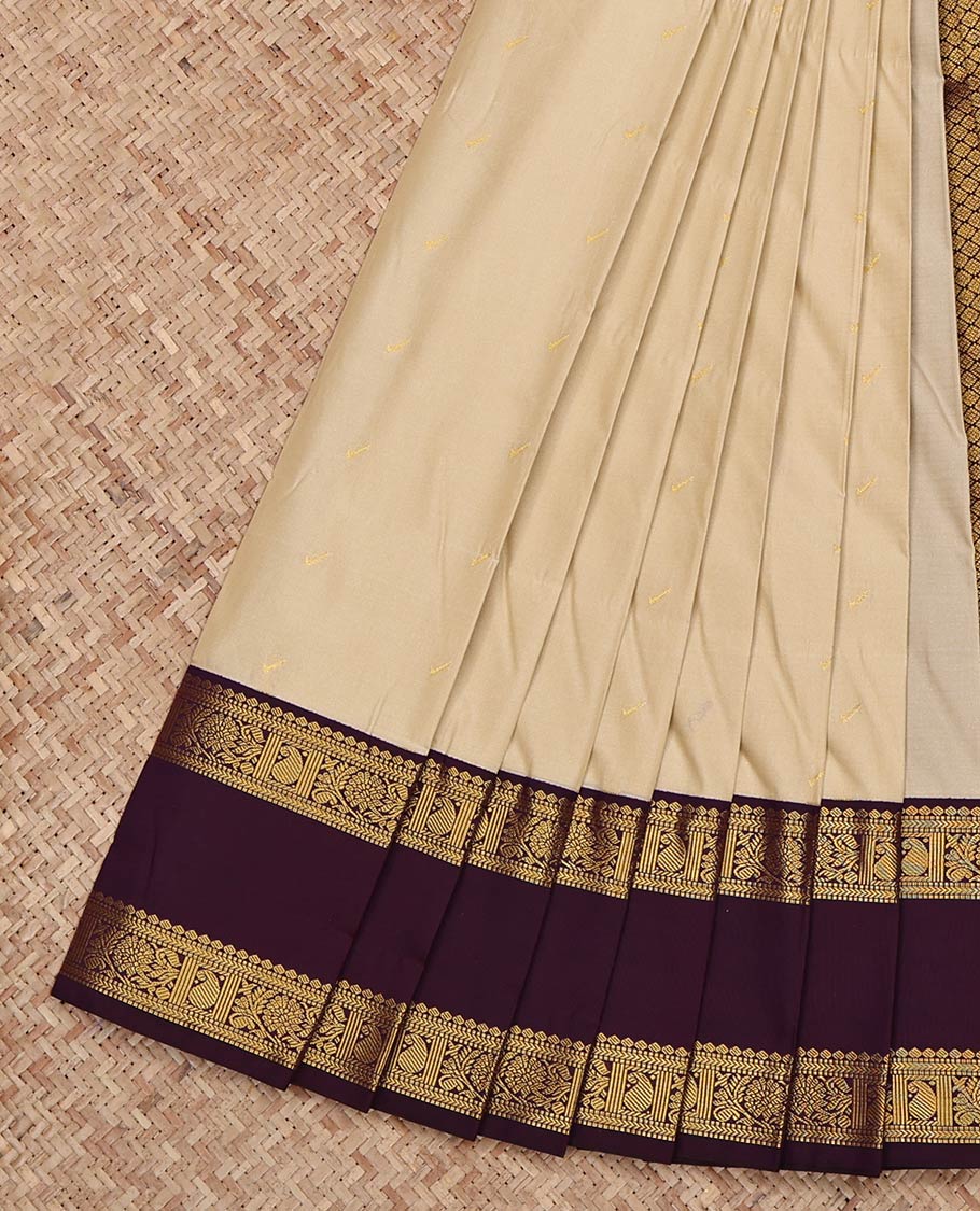 Beige Budget Silk Saree, Subtly Sparkled with Zari Buttas on Its Body, Complemented by Contrast Traditional Zari Design Rettai Pettu Border, Grand Jaal Pallu, and Paired with a Contrast Blouse