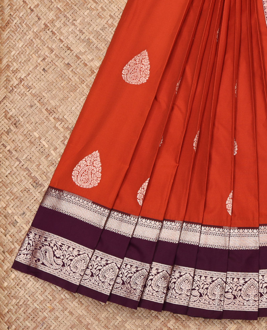 Orange Budget Silk Saree, Spotlighted with Zari Buttas All Over Its Body, Complemented by a Contrast Traditional Zari Design Rettai Pettu Border, Grandly Zari Woven Pallu, and Paired with a Contrast Blouse