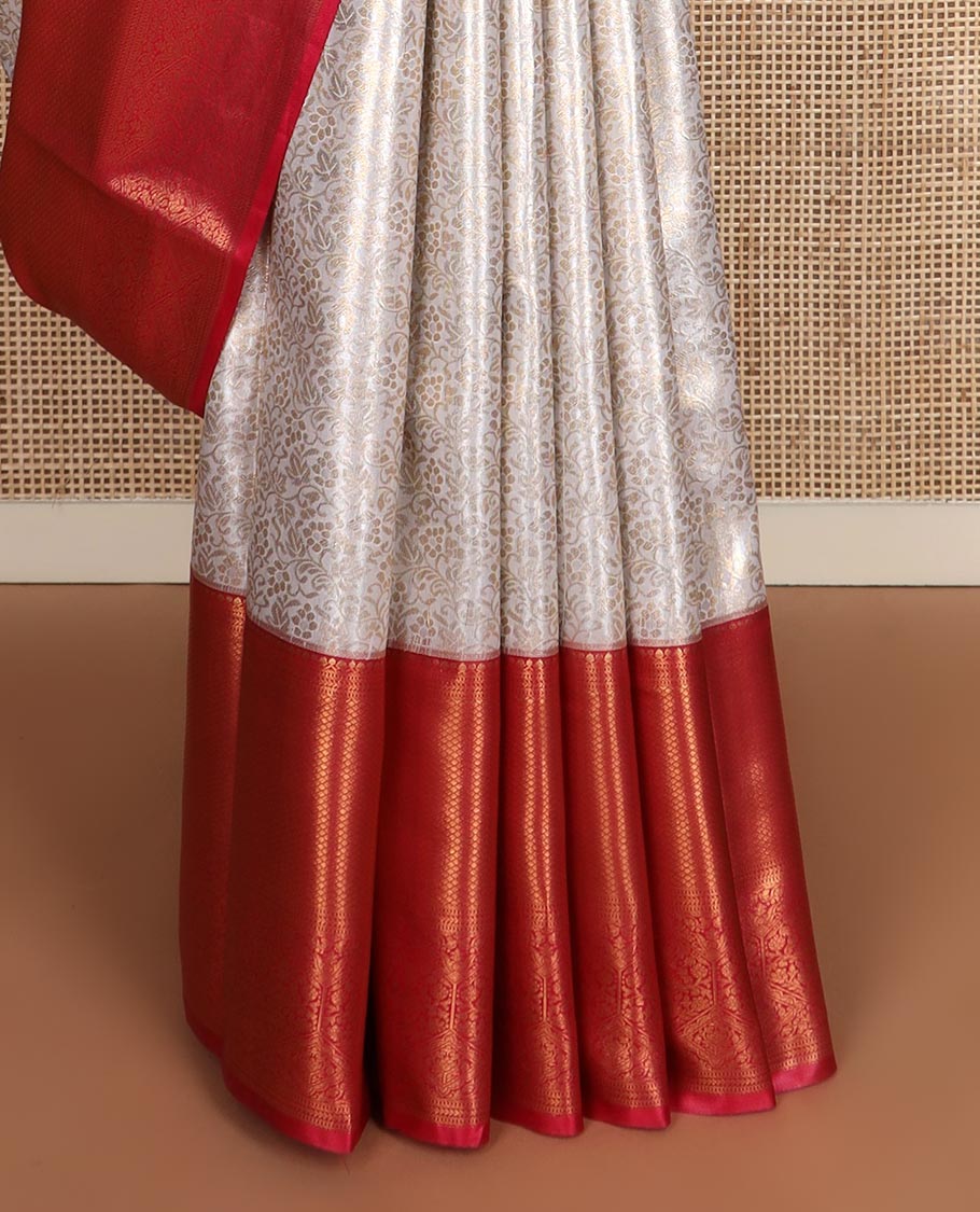Cream floral jaal jacquard budget silk saree, contrast traditional zari border, and ogee patterned pallu