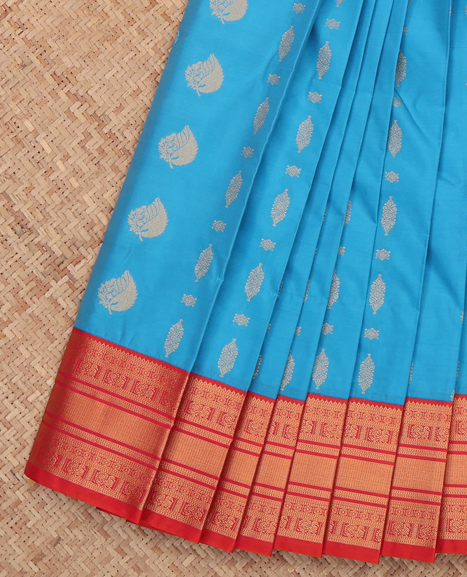 Blue Budget Silk Saree, Adorned with Zari Buttas, a Contrast Traditional Zari Border, Jaal Pallu, and a Contrast Blouse