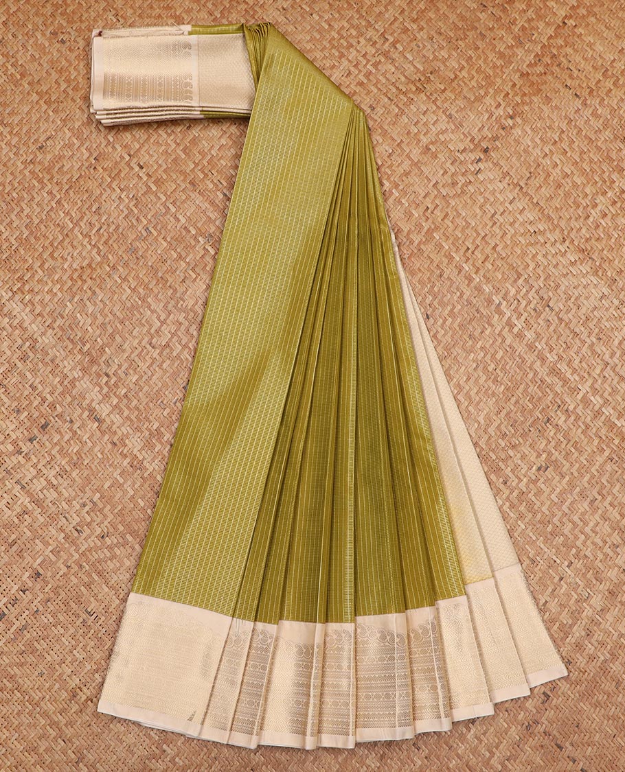 Green micro-checked design gift saree, contrast traditional zari design border, and intricate pallu