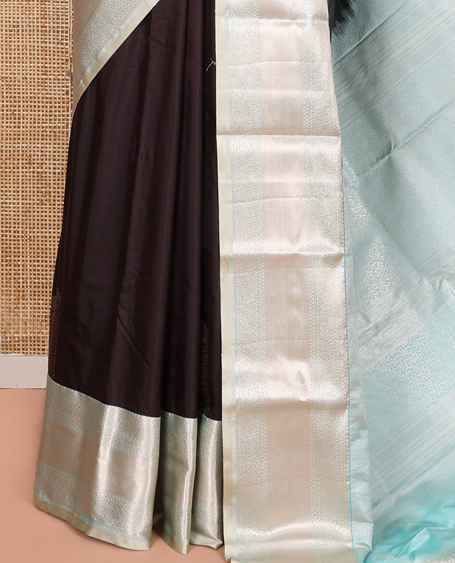 Dark Brown Budget Silk Saree, Majestically Detailed with Zari Buttas All Over Its Body, Complemented by a Contrast Border of Traditional Zari Designs, Beautifully Bedecked Pallu, and Paired with a Contrast Blouse