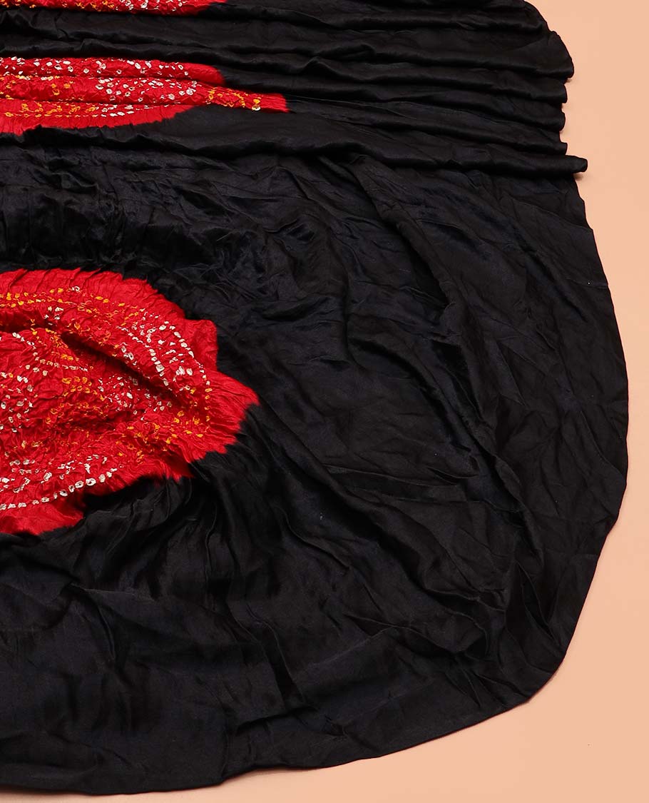 Borderless black dots enclosed big circle motifs bandhani silk saree, butta enclosed thick zari checked gharchola pallu