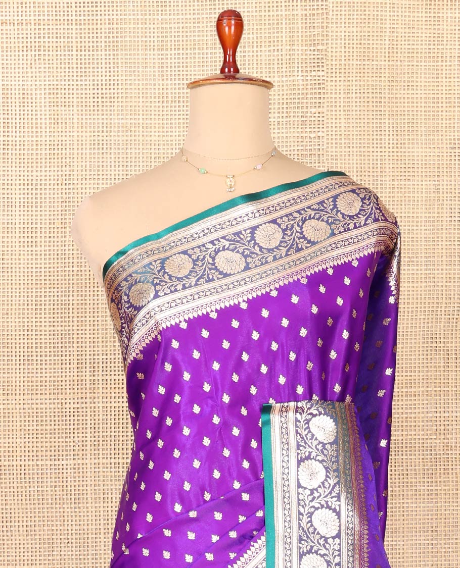 Violet Semi-Banaras Saree, Detailed with Buttas on Its Body, Complemented by a Contrast Floral Creeper Design Border, Intricately Designed Pallu, and Paired with a Contrast Blouse