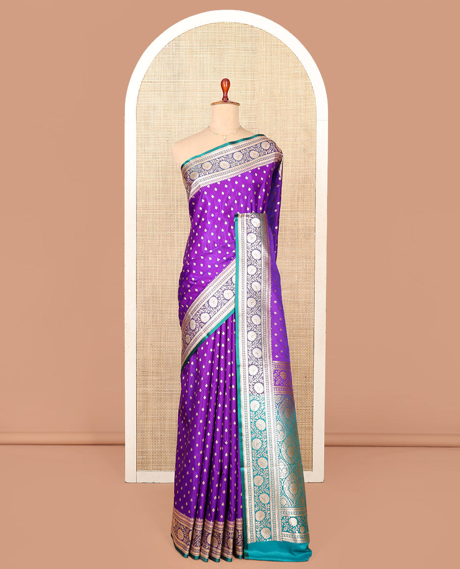 Violet Semi-Banaras Saree, Detailed with Buttas on Its Body, Complemented by a Contrast Floral Creeper Design Border, Intricately Designed Pallu, and Paired with a Contrast Blouse