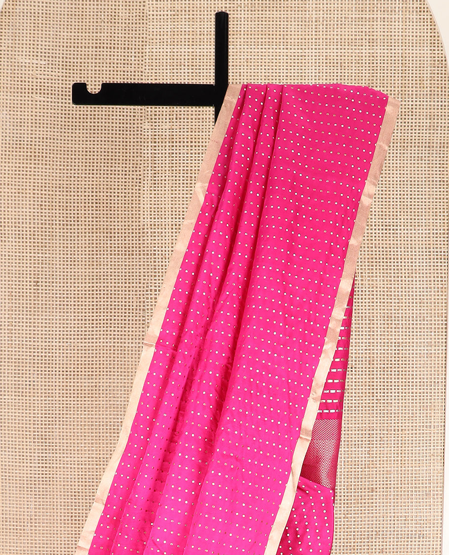 Bright pink dobbly style dotted banarasi silk saree, piping zari border, and chevron striped pallu