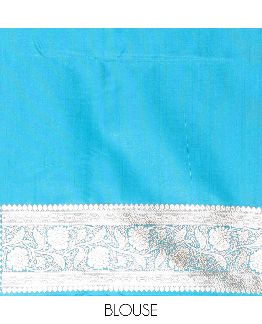 Light blue floral jaal jacquard banarasi silk saree, floral creeper design border, and intricate ogee patterned pallu