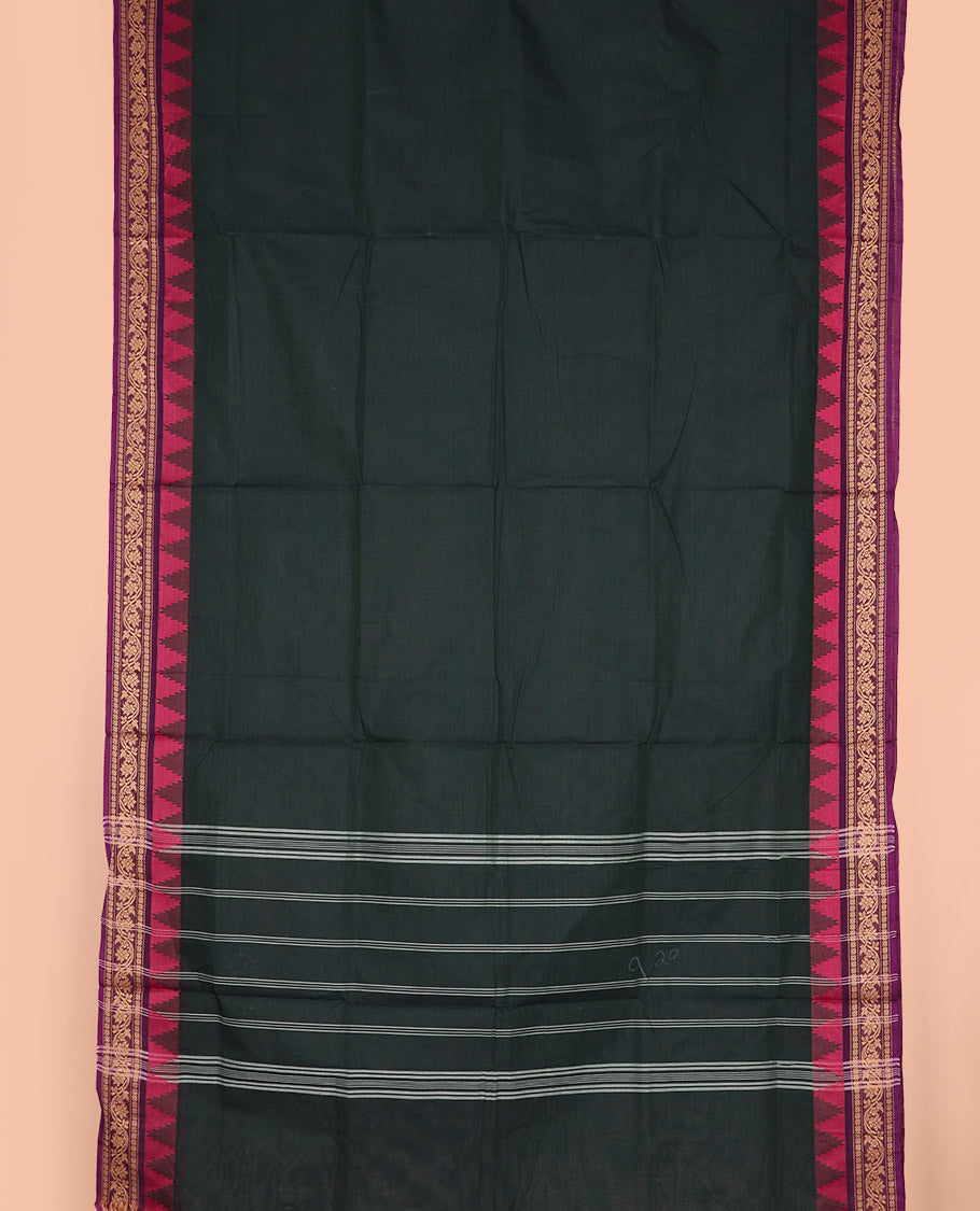 Deep green plain nine-yard cotton saree, contrast traditional temple border, and striped pallu