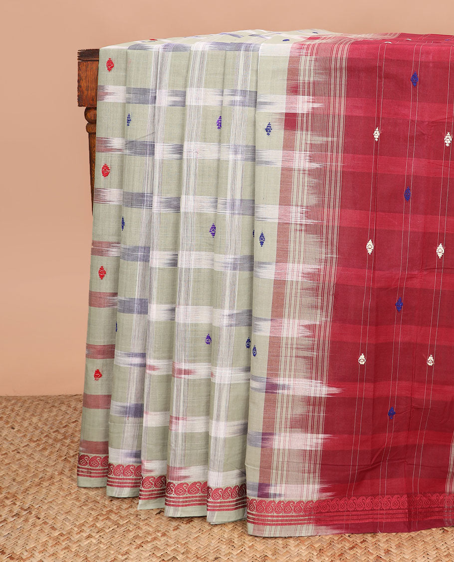 Pale green buttas and checked Andhra cotton saree, paisley border, and contrast pallu of stripes and buttas