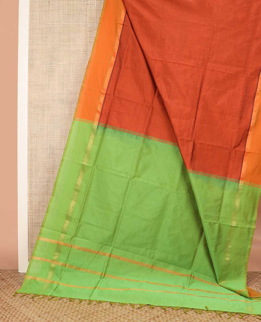 Orange plain poly cotton saree, contrast zari border, and contrast zari striped pallu