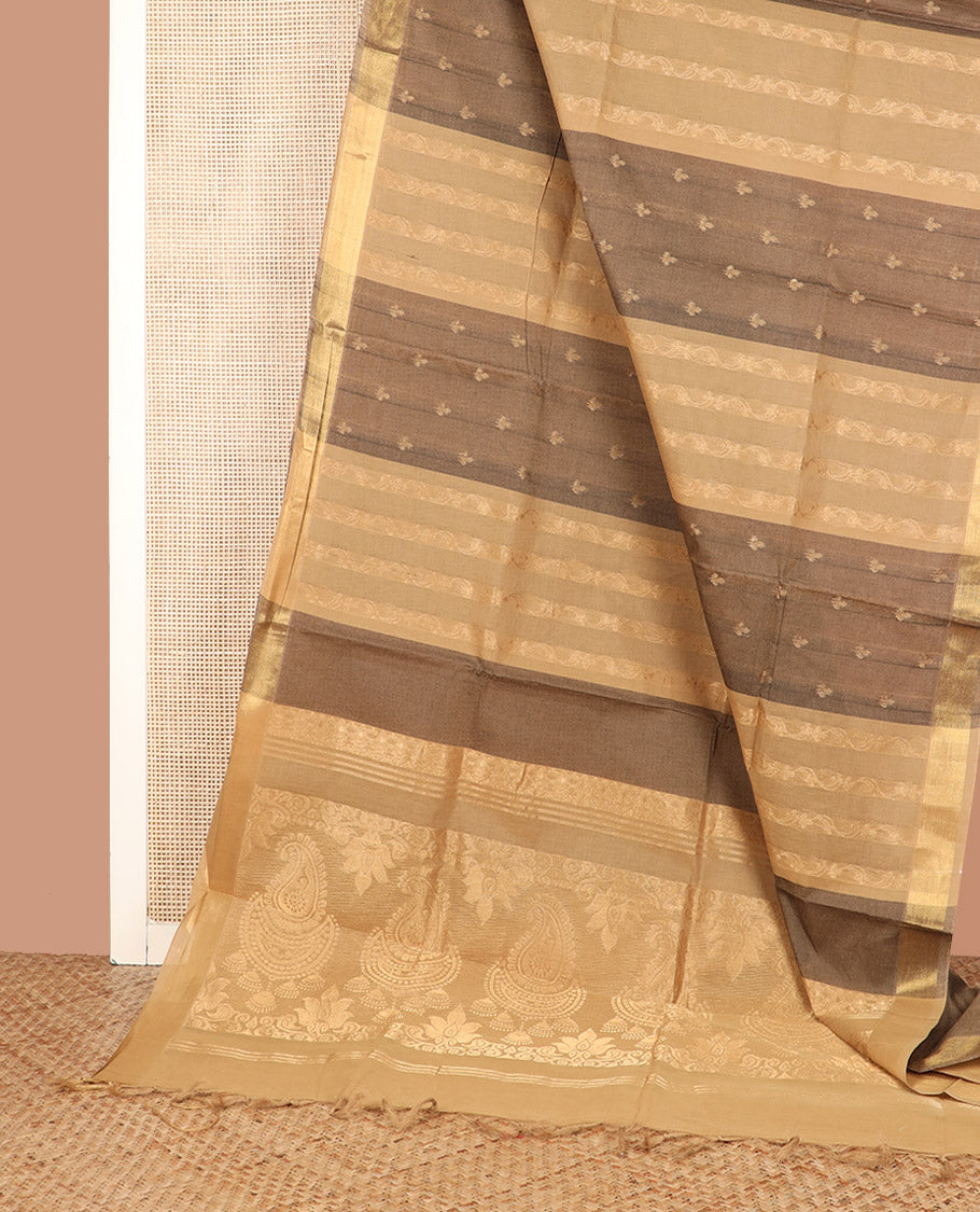 Brown and Sandal Coimbatore Cotton Saree Prettified with Floral Buttas and Floral Creeper Designs All Over Its Body, Pallu Pictures Intricate Floral-Paisley Designs, and Paired with a Matching Blouse