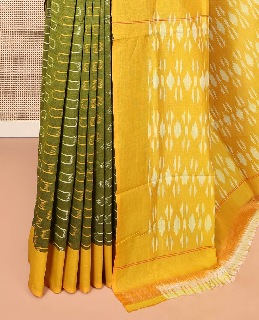 Green Ikkat Cotton Saree, Embellished with Ikkat-Style Buttas on Its Body, Complemented by Contrast Border, Pallu Steeped with Ikkat Buttas, and Has No Blouse