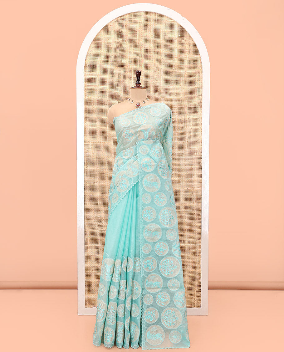 Sea Green Organza Saree, Delicately Woven with Floral Enclosed Circle Motifs Thread Embroidery, Subtle Scallop Border, Delicately Embroidered Pallu, and Paired with a Matching Embroidered Blouse
