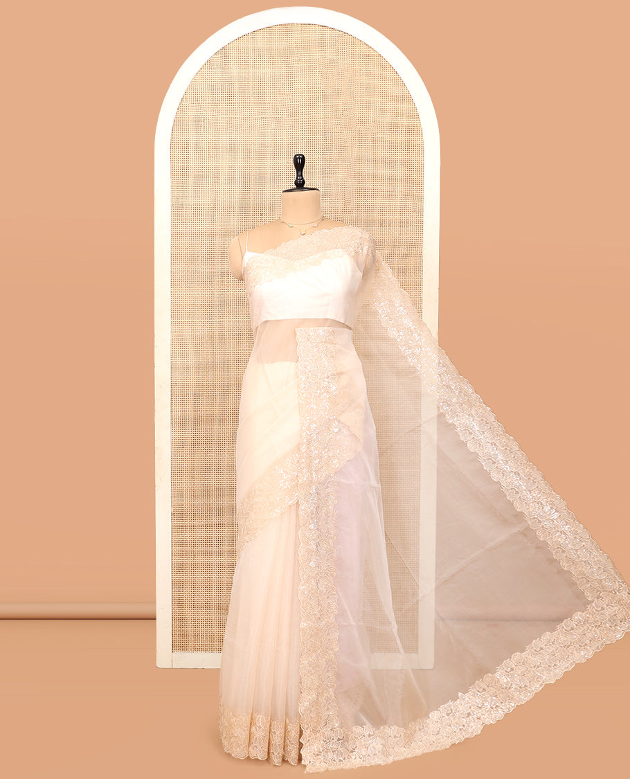 Light Sandal Plain Organza Saree, a Scallop Floral Sequins Embroidered Border, and a Matching Blouse