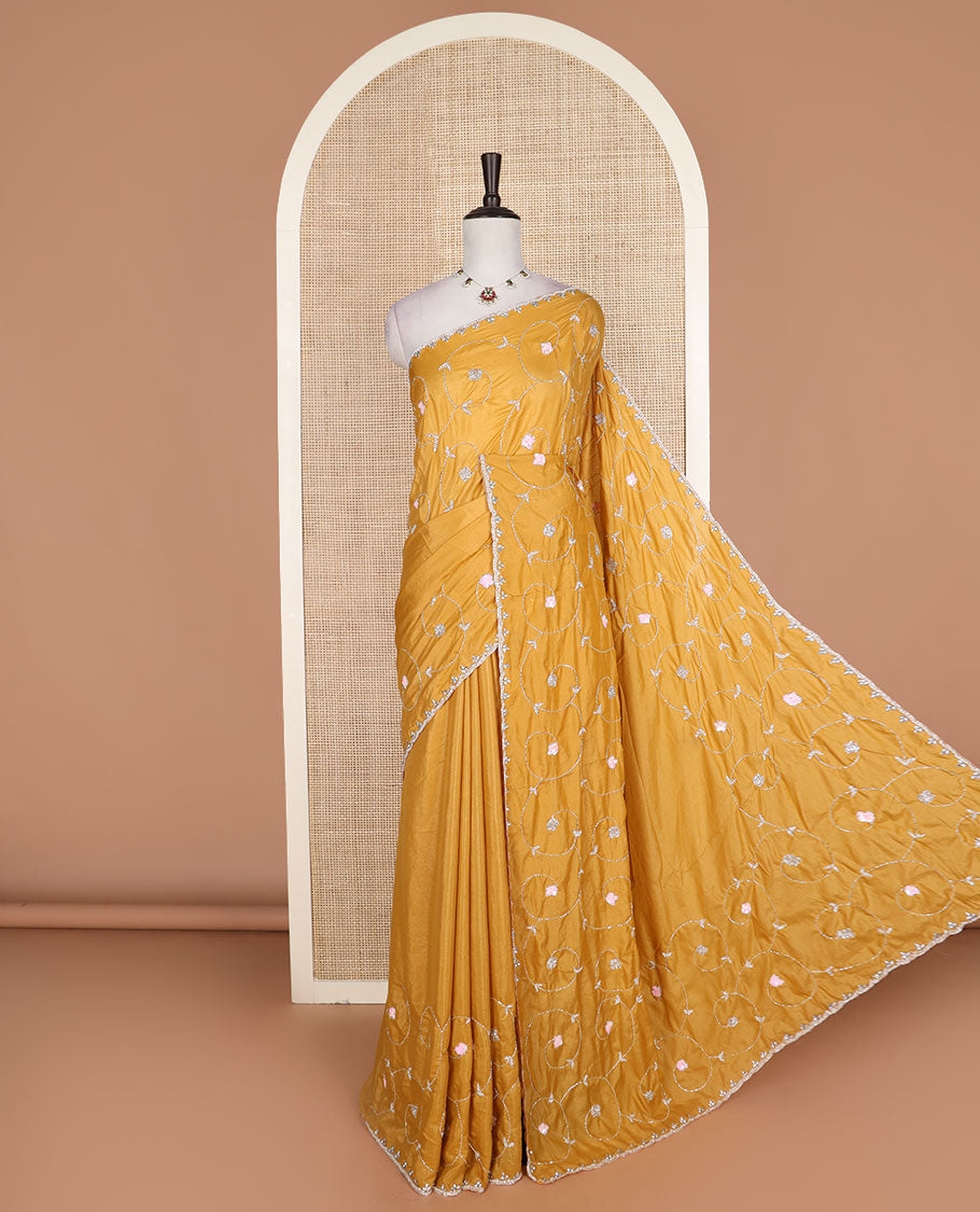 Yellow floral vine kardana embroidered designer saree, stone work border, and floral vine kardana embroidered pallu