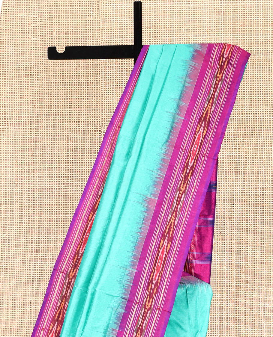 Blue Plain Pochampally Ikat Silk Saree, Complemented by a Contrast Temple Ikat Border, Ikat-Style Pallu, and No Blouse