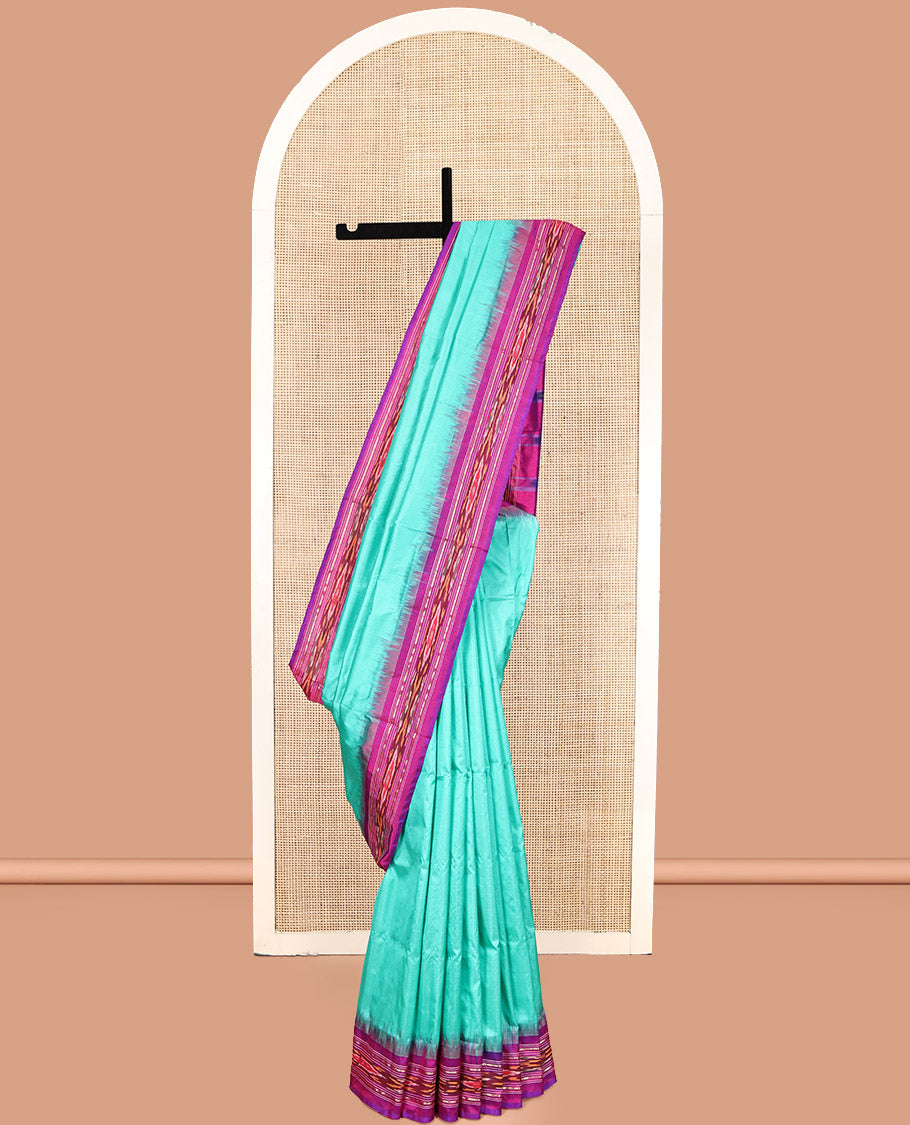Blue Plain Pochampally Ikat Silk Saree, Complemented by a Contrast Temple Ikat Border, Ikat-Style Pallu, and No Blouse