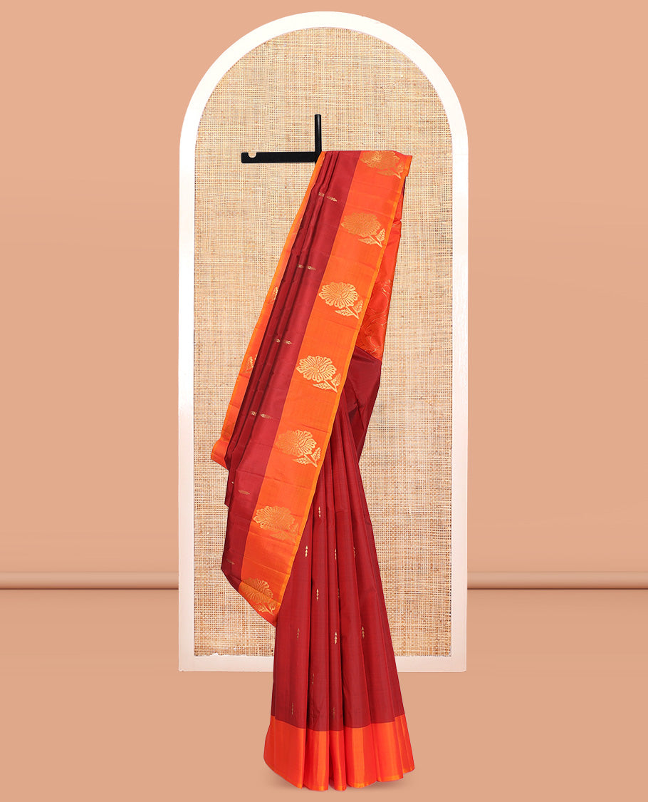 Maroon Kanchipuram Silk Saree, Highlighted with Zari Buttas, Complemented by a Contrast Floral Butta Border, Zari Design Pallu, and a Contrast Blouse