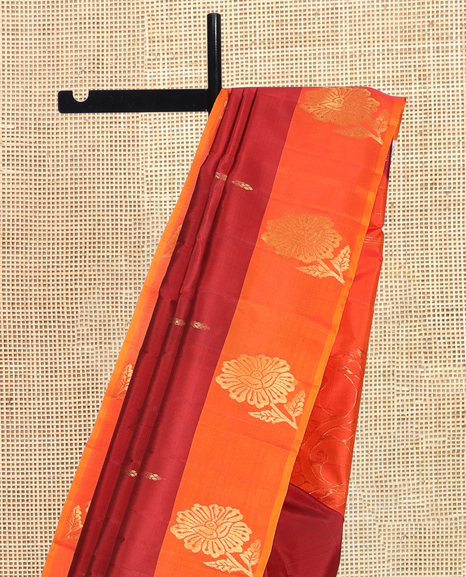 Maroon Kanchipuram Silk Saree, Highlighted with Zari Buttas, Complemented by a Contrast Floral Butta Border, Zari Design Pallu, and a Contrast Blouse