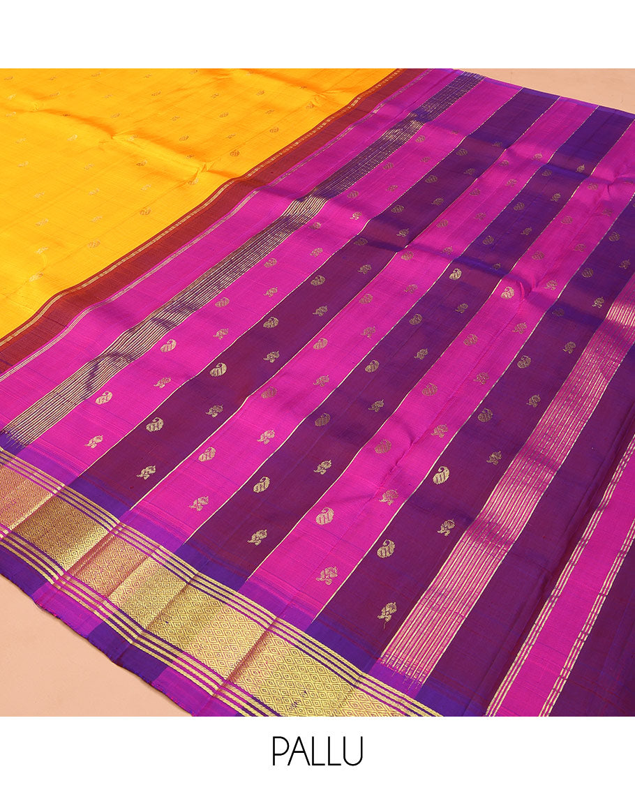 Yellow Kanchipuram Silk Saree, Bedecked with Zari Buttas on Its Body, Complemented by Contrast One-Sided Korvai Border of Banaras, and Mayil Kann Designs, Pallu Features Zari Designs, and Comes Without a Blouse