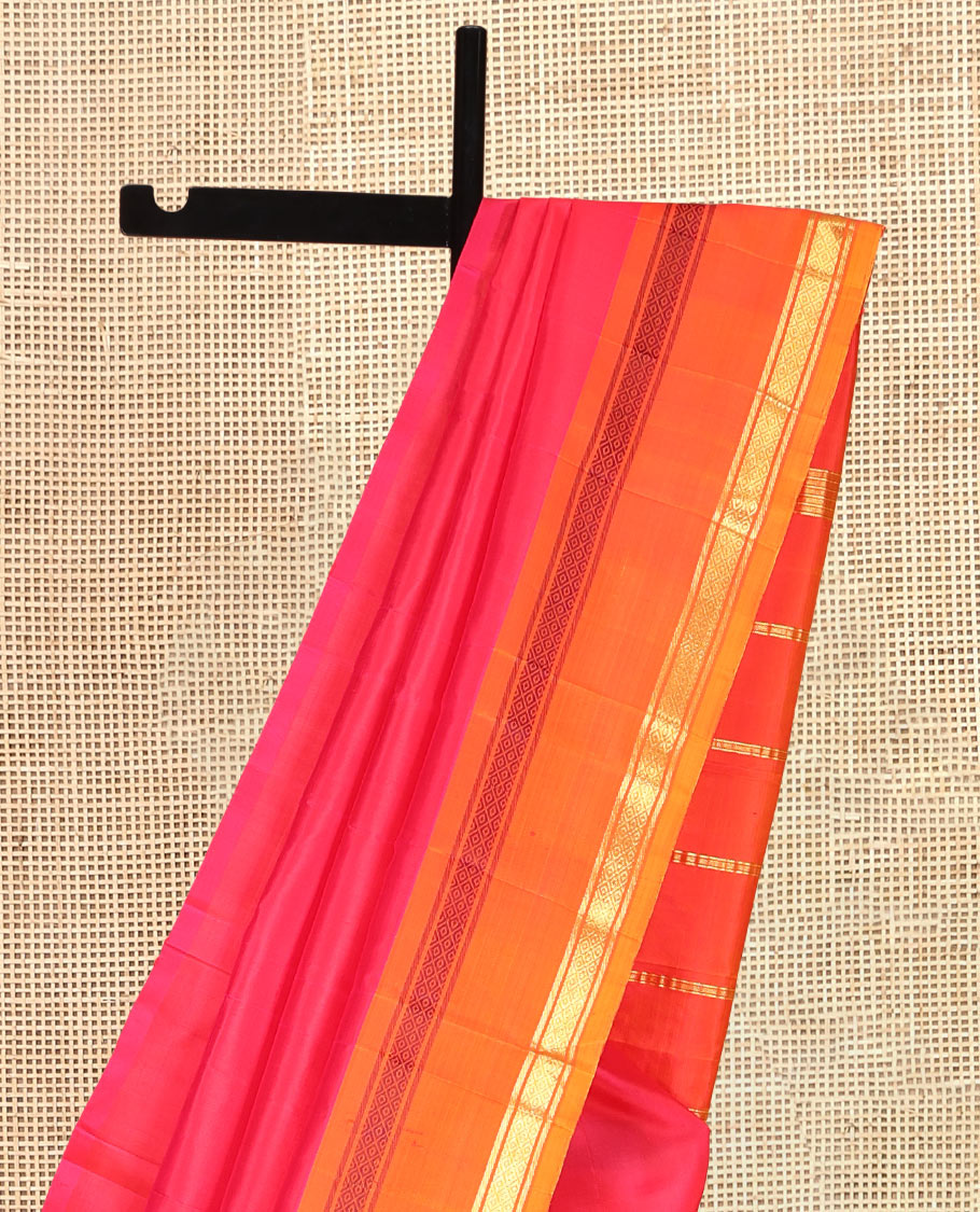 Red Kanchipuram Silk Saree, Complemented by a Contrast One-Sided Rettai Pettu Border of Banaras, and Mayil Kann Designs, Zari Woven Pallu, and a No Blouse