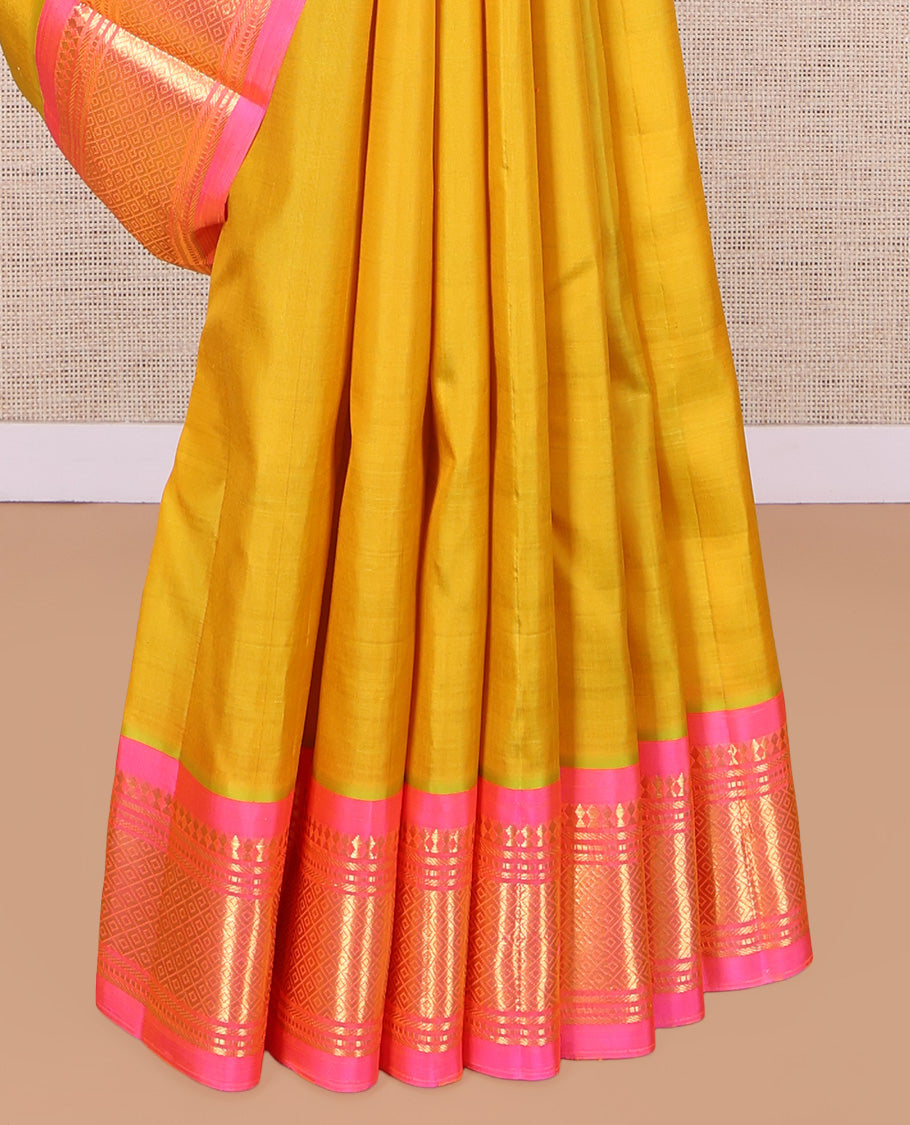 Green Kanchipuram Silk Saree, Sparsely Woven with Zari Buttas, a Contrast One-Sided Border of Panner Sombu, Banaras, Muthu, and Mayil Kann Designs, Zari Design Pallu, and No Blouse