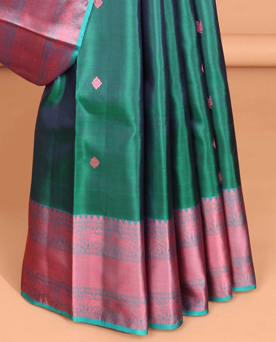 Green floral buttas kancheepuram silk saree with contrast border of thilakam mokku, muthu, paun, banaras design & zari design pallu