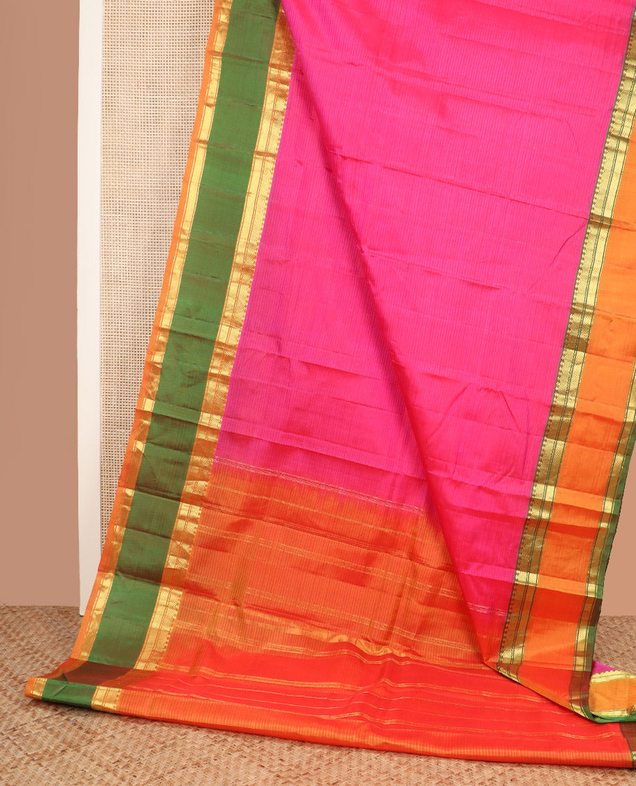 Pink striped Kanchipuram silk saree, contrast ganga jamuna border of diamond, vanki, banaras, and muthu designs, and striped pallu