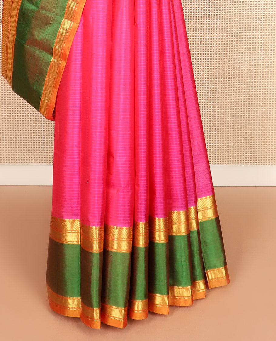 Pink striped Kanchipuram silk saree, contrast ganga jamuna border of diamond, vanki, banaras, and muthu designs, and striped pallu