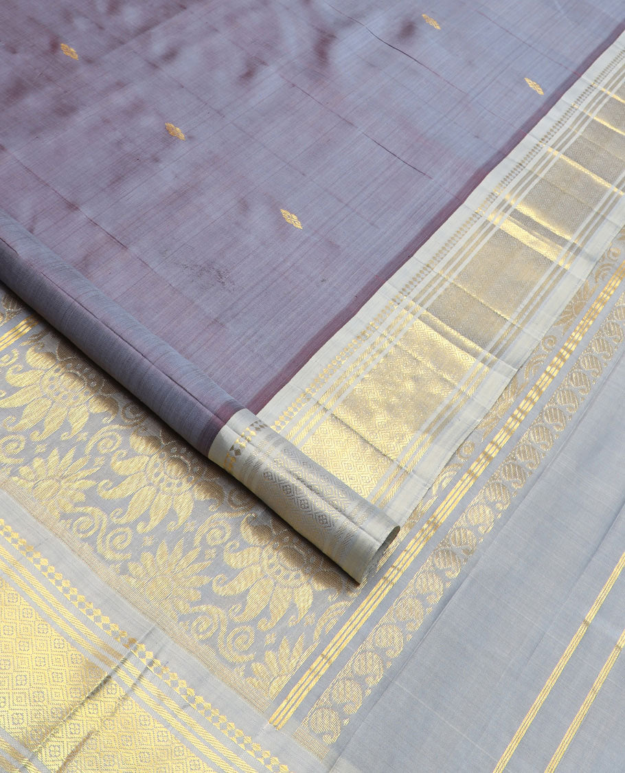 Grey zari buttas Kanchipuram silk saree, zari border of paneer sombu, banaras, and jaal designs, and floral design pallu