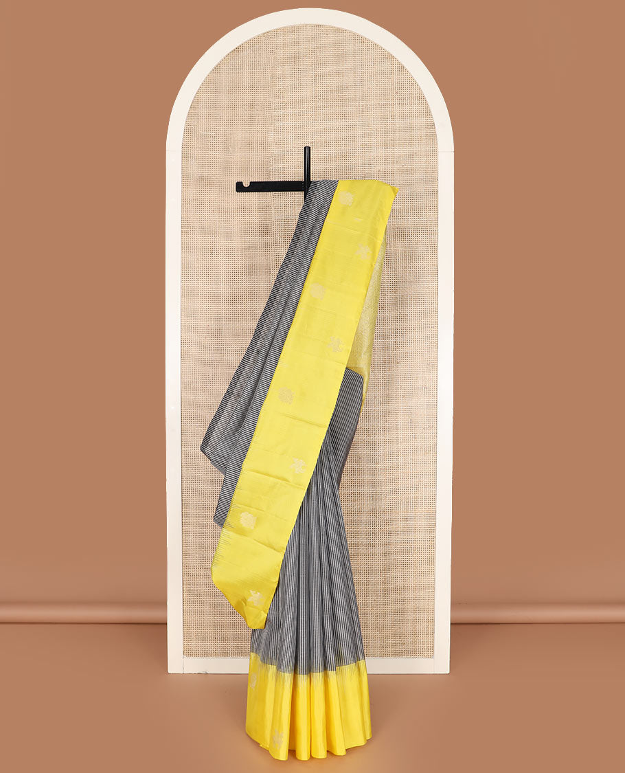 Multi-color micro-checked Kanchipuram silk saree, contrast border of animal motifs, and pallu of floral creeper designs