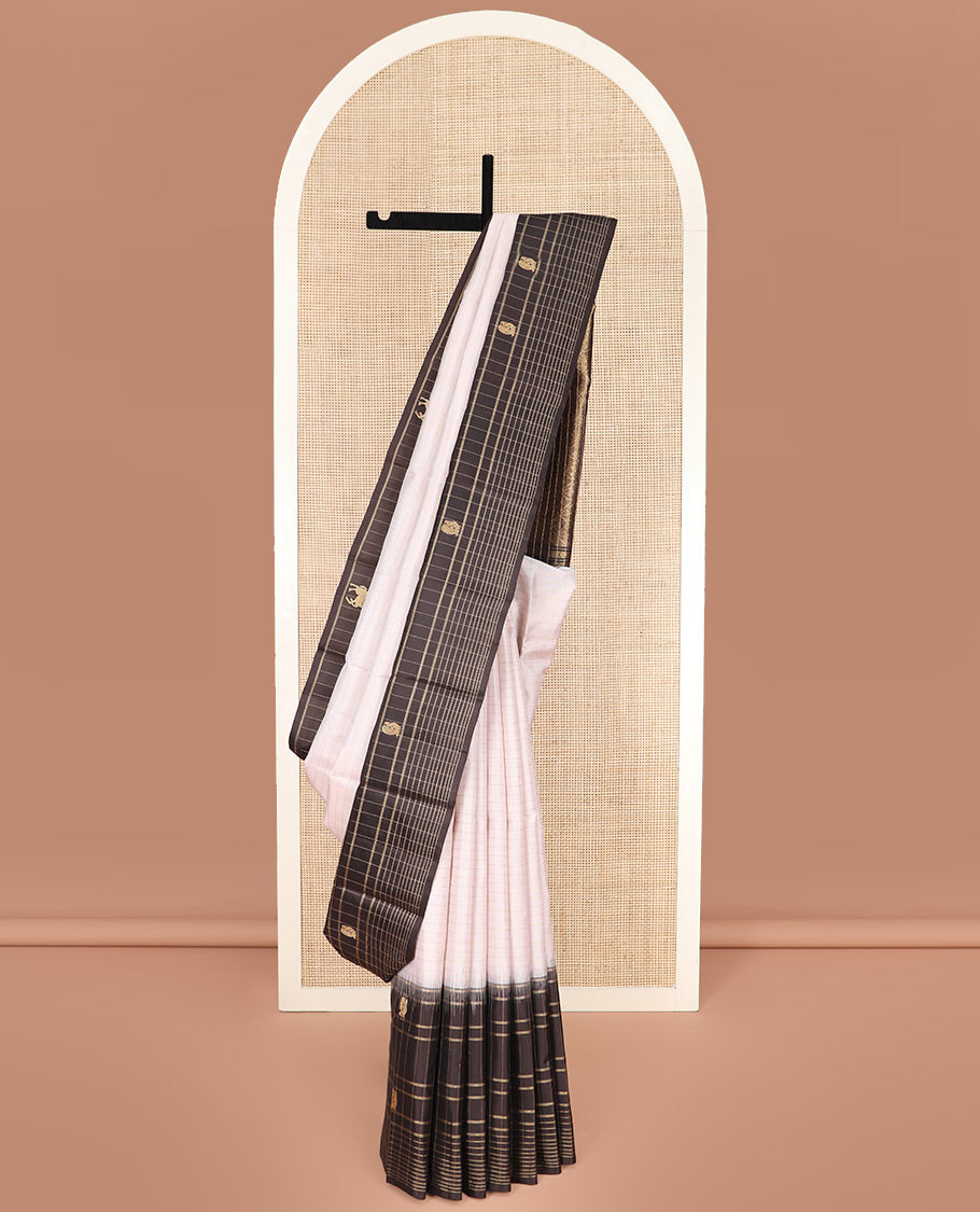 White Kanchipuram Silk Saree Decorated with Stripes All Over Its Body, Complemented by a Contrast Border of Muthu Kattam and Annam Buttas, Pallu of Jaal Design, and Paired with a Contrast Blouse