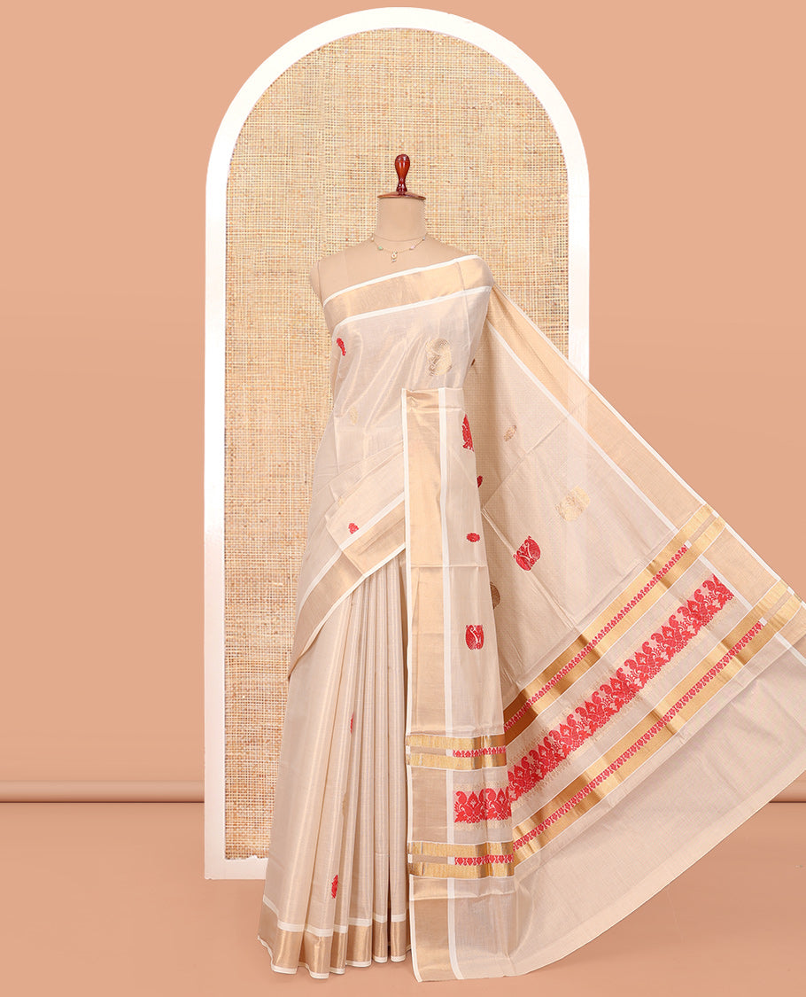Cream Kerala Cotton Saree, Accentuated with Thread and Zari Buttas All Over Its Body, a Zari Bavanji Border, Pallu of Elephant Designs, and Paired with a Matching Blouse