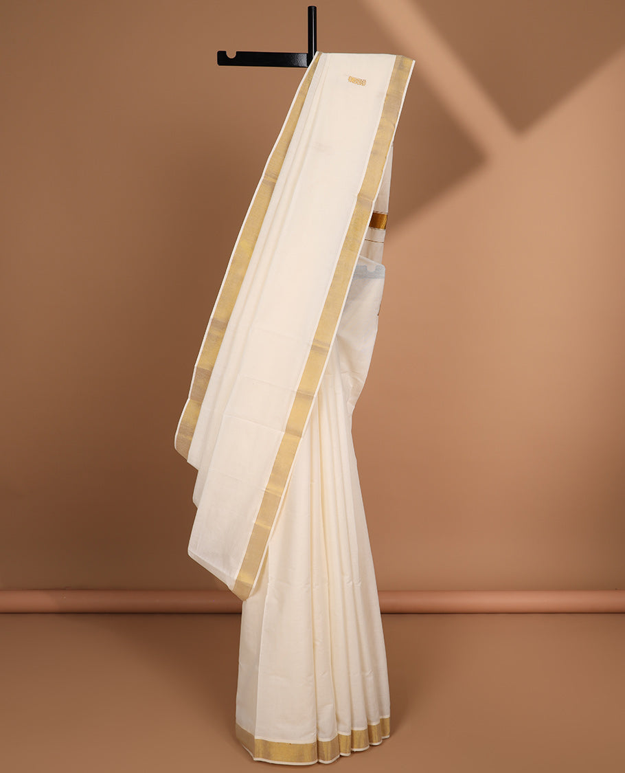 Cream zari buttas kerala saree, zari border & pallu of zari designs