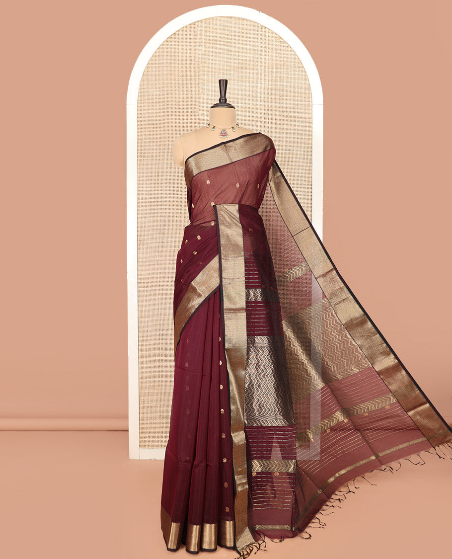 Maroon Maheshwari Cotton Saree Beautified with Floral Buttas, Highlighted with a Chevron Striped Zari Border, Pallu Steeped with Zari Stripes and Chevron Stripes, and Paired with a Matching Blouse