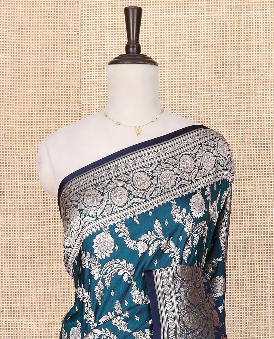 Peacock blue floral jaal jacquard mushru silk saree, floral design border, and pallu of intricate designs