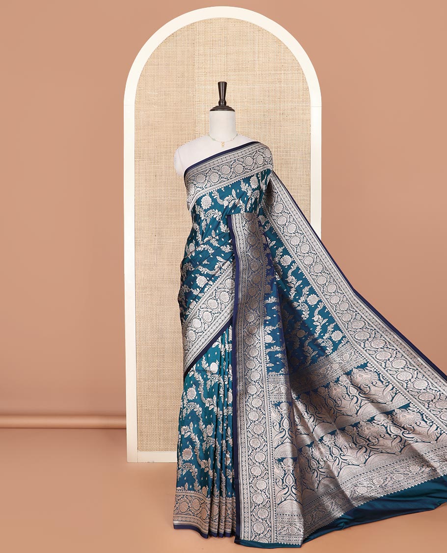 Peacock blue floral jaal jacquard mushru silk saree, floral design border, and pallu of intricate designs
