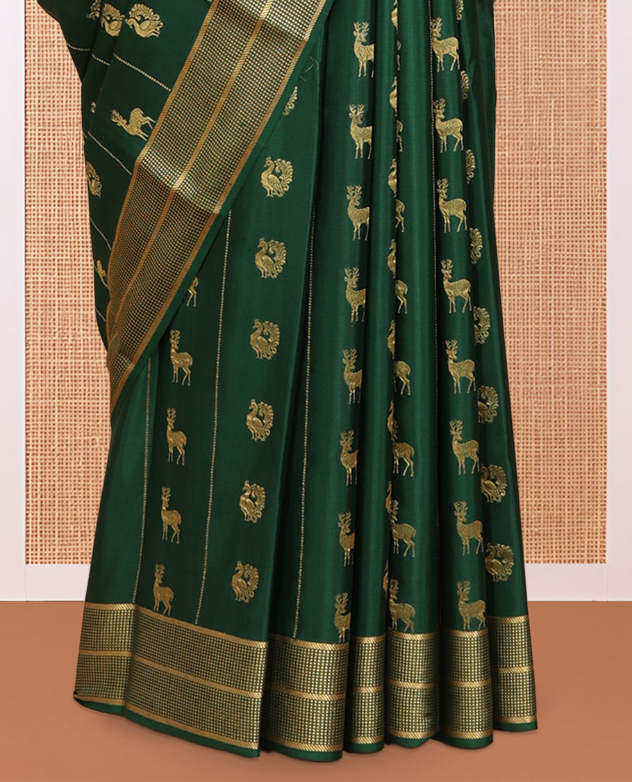 Green Mysore Silk Saree, Artfully Woven with Peacock-Deer Zari Buttas, Complemented by a Zari Geometric Border, a Grand Pallu, and a Matching Blouse