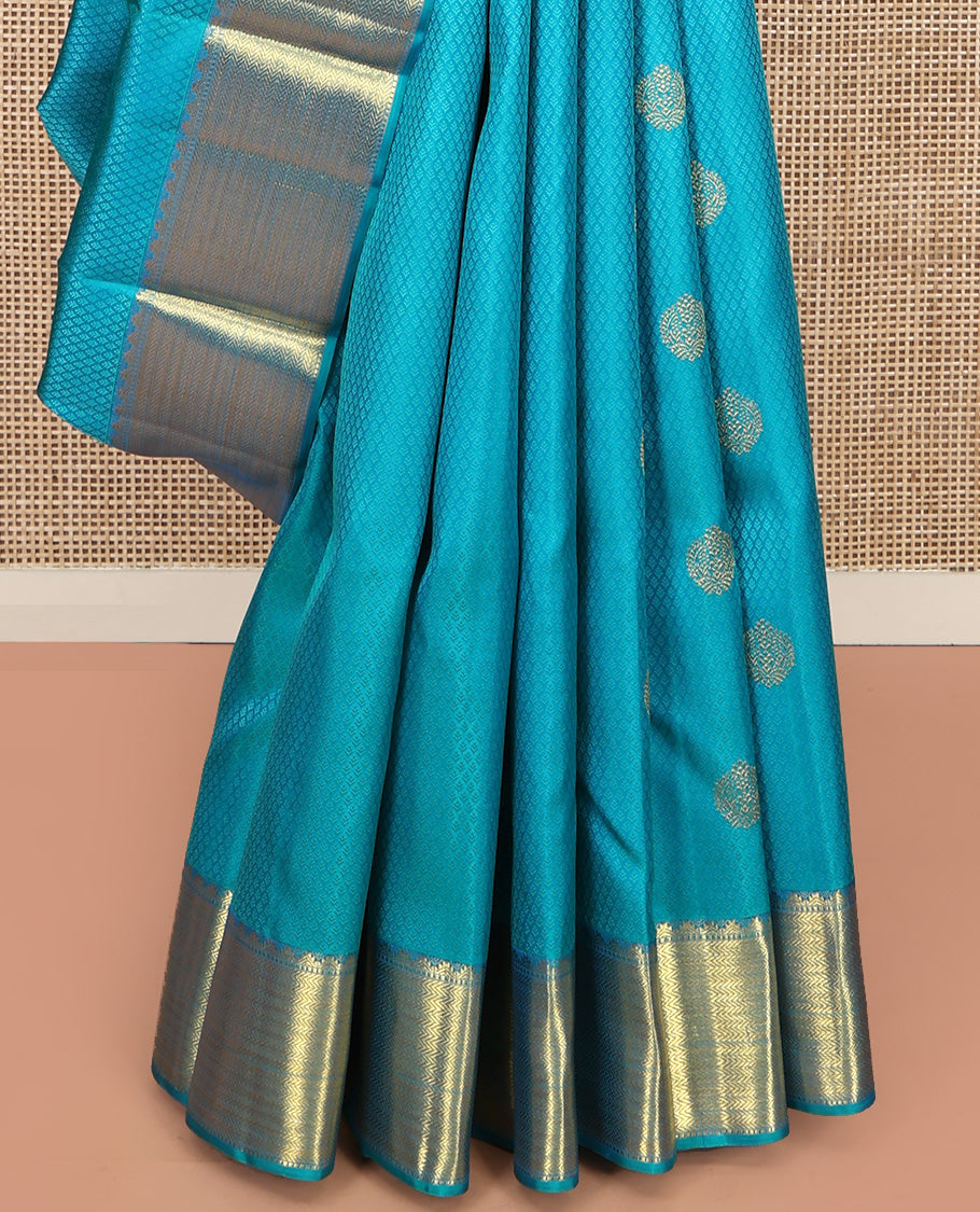Blue Parampara Silk Saree, Adorned with Zari Buttas and Embossed Texture On Its Body, Highlighted by Zari Border of Thazampoo Rekku, Muthu, and Vanki Designs, Pallu Features Vanki Designs and Paired with a Matching Blouse