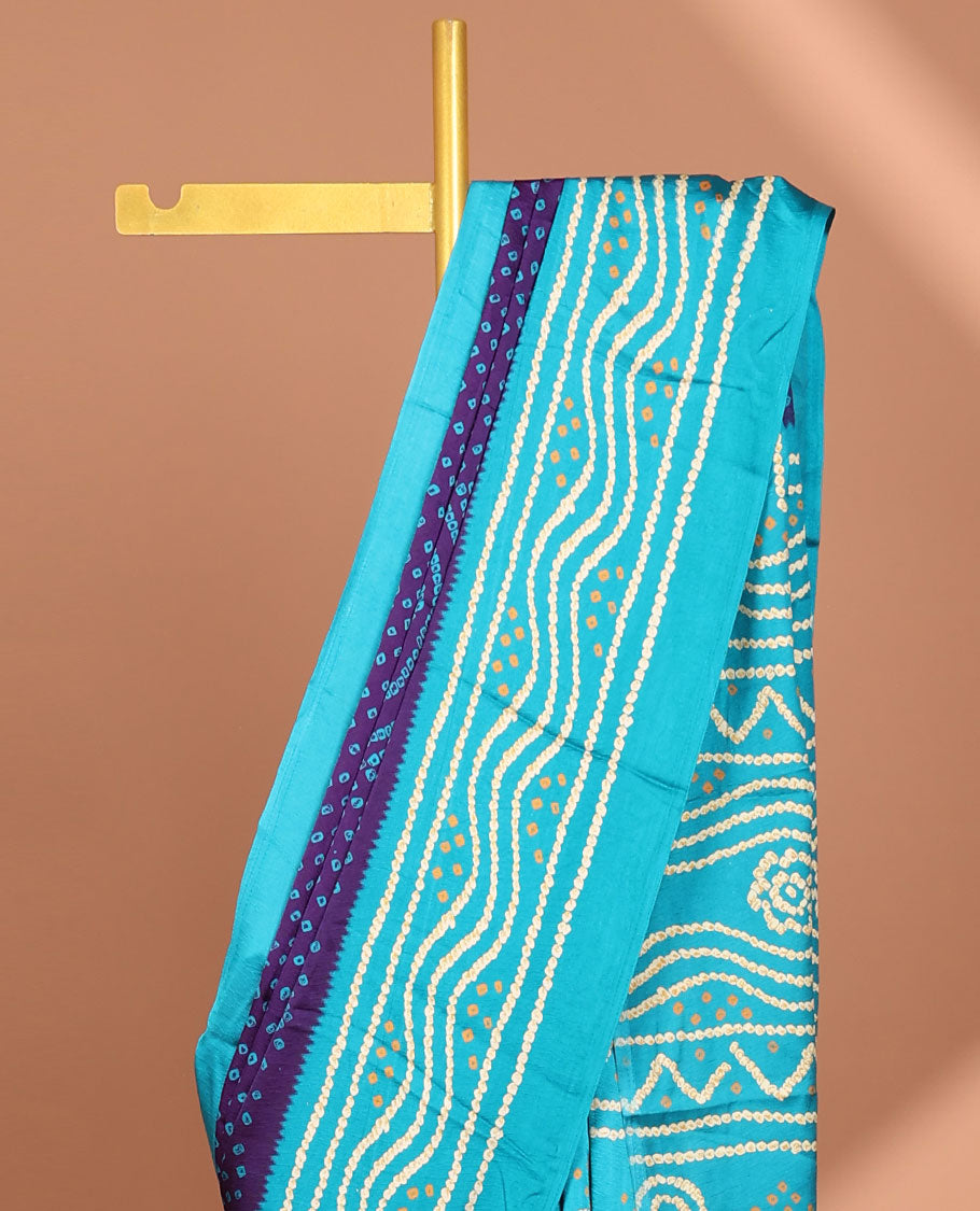 Purple all over bandhani printed crepe silk saree with contrast bandhani printed border