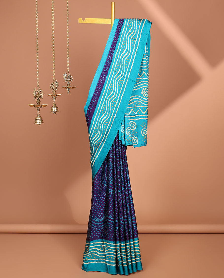 Purple all over bandhani printed crepe silk saree with contrast bandhani printed border
