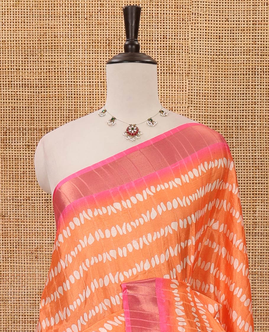 Orange uniquely printed soft tussar saree, contrast zari border, kalamkari floral vine printed pallu & kalamkari printed blouse