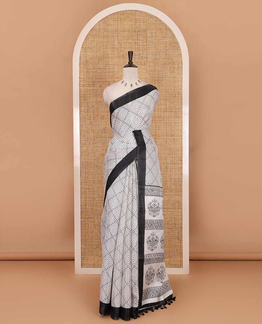 White-black diamond patterned khadi cotton saree, contrast plain border, intricate print pallu & contrast star motifs printed blouse
