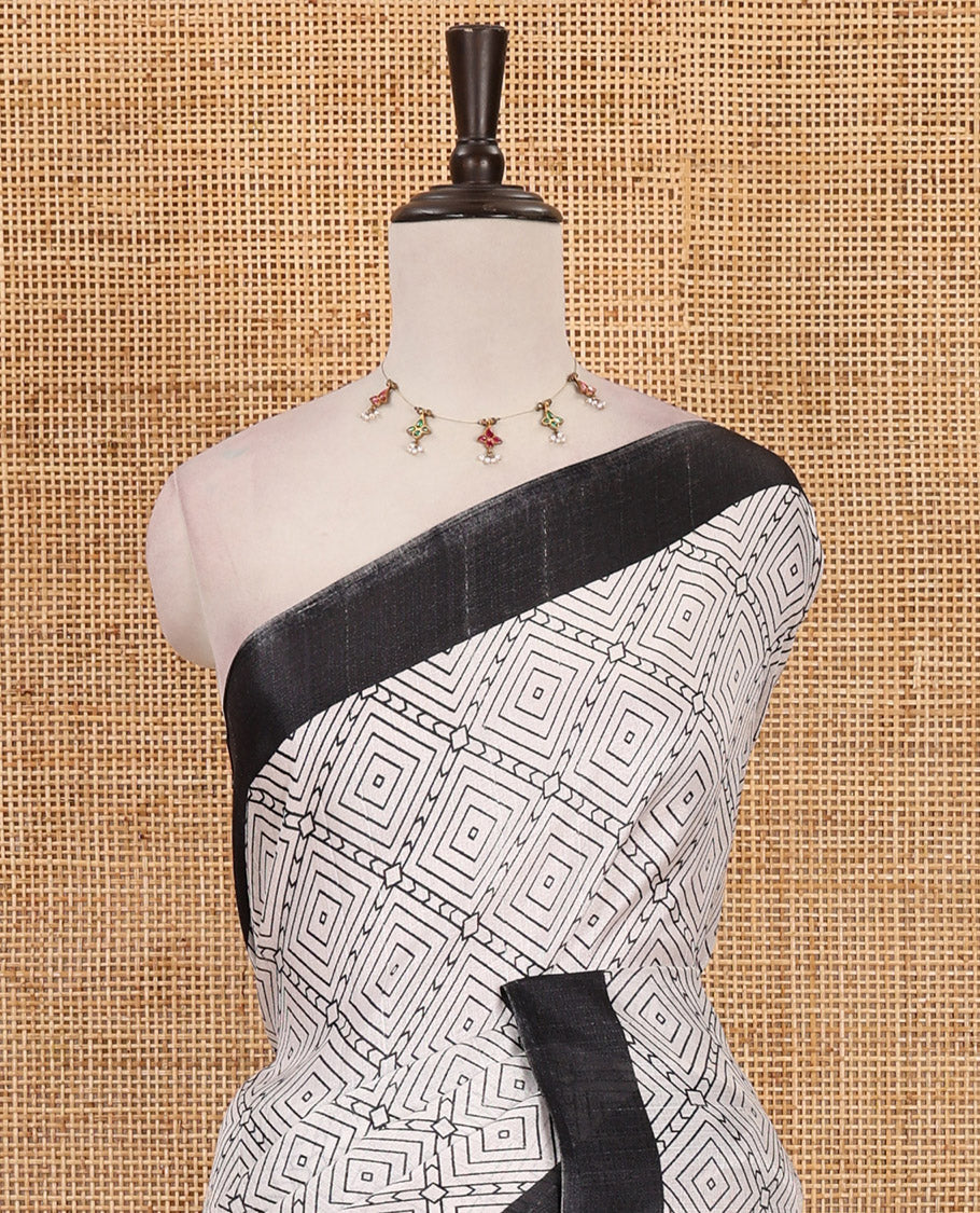 White-black diamond patterned khadi cotton saree, contrast plain border, intricate print pallu & contrast star motifs printed blouse
