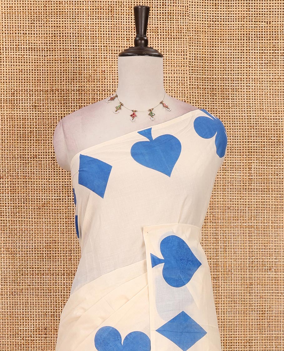Cream-blue plain Kerala cotton saree, contrast color cards-theme printed border of Diamonds, Clubs, and Spades, leheriya-striped pallu, and plain blouse