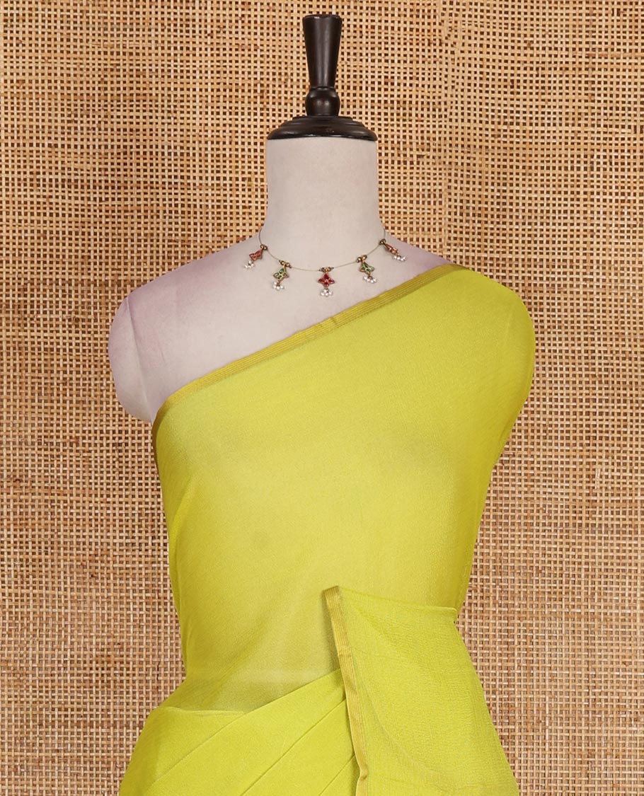 Borderless leaf green plain design viscose saree, flower motifs printed matching blouse
