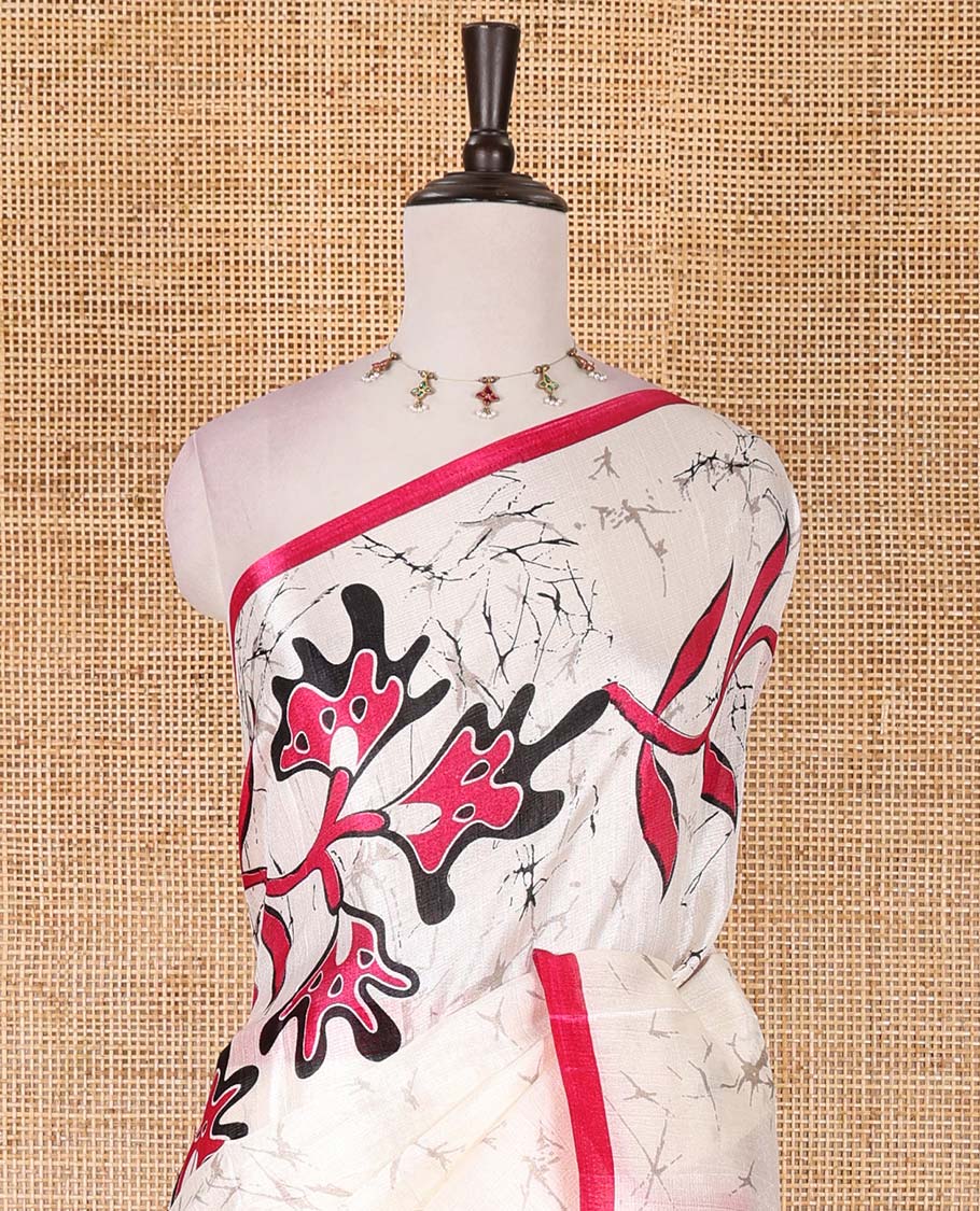 Half-white batik-style floral vine printed khadi cotton saree, contrast rani pink border, batik floral printed, and contrast flower motifs printed blouse